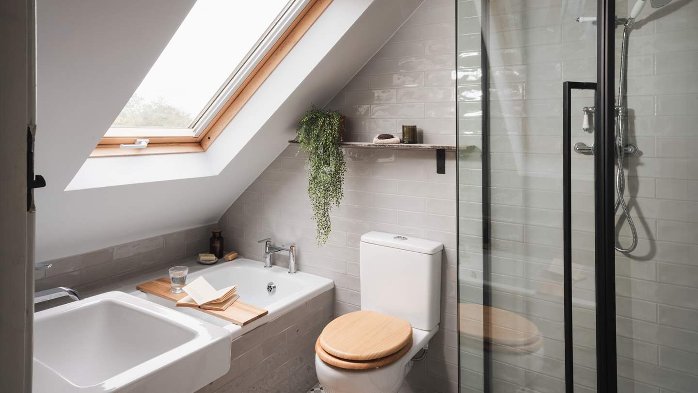 For wistful moments of self-care, there is a bathtub, as well as a spacious walk-in shower