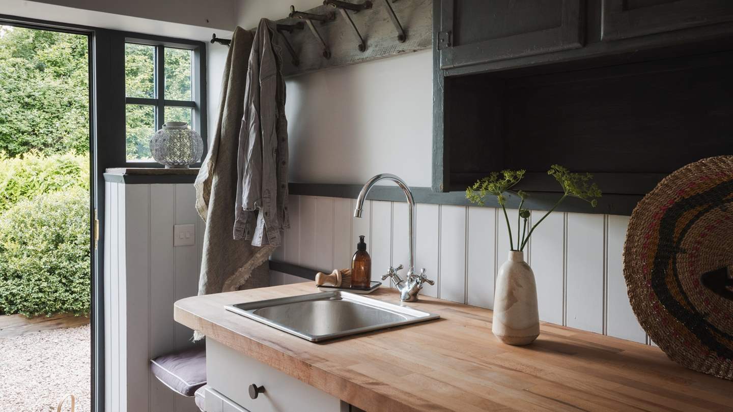 In addition, you’ll find a washer/tumble dryer in the utility room