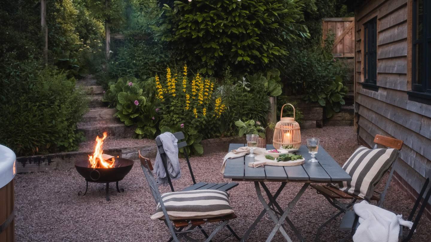 Gather beside the firepit at twilight for moments of staycation magic