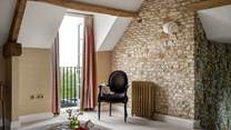 Completing the dream is a Juliet balcony, a stunning spot to admire the perfectly pastoral backdrop