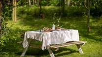 Verdant lawns provide ample space for picnics on summer days...