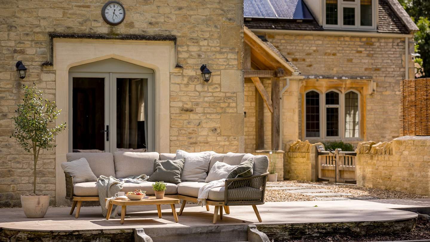 A spacious patio is an exquisite backdrop for summer scenes 