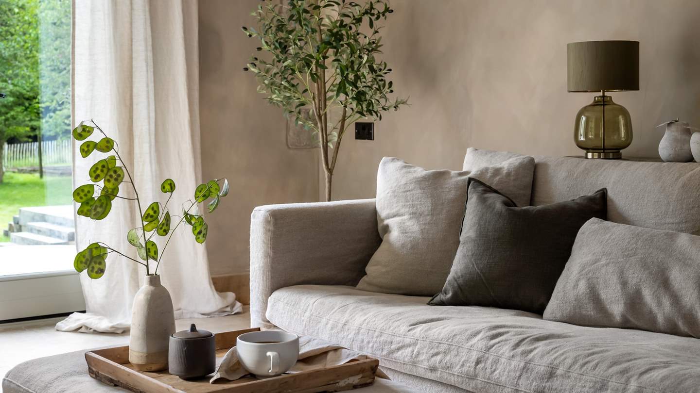 Textures take the lead in the romantic sitting room adorned in pretty muted hues...