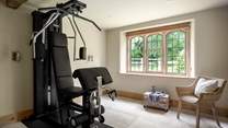 On the ground floor resides a dedicated workout space, where you’ll find a Unica home multi-gym
