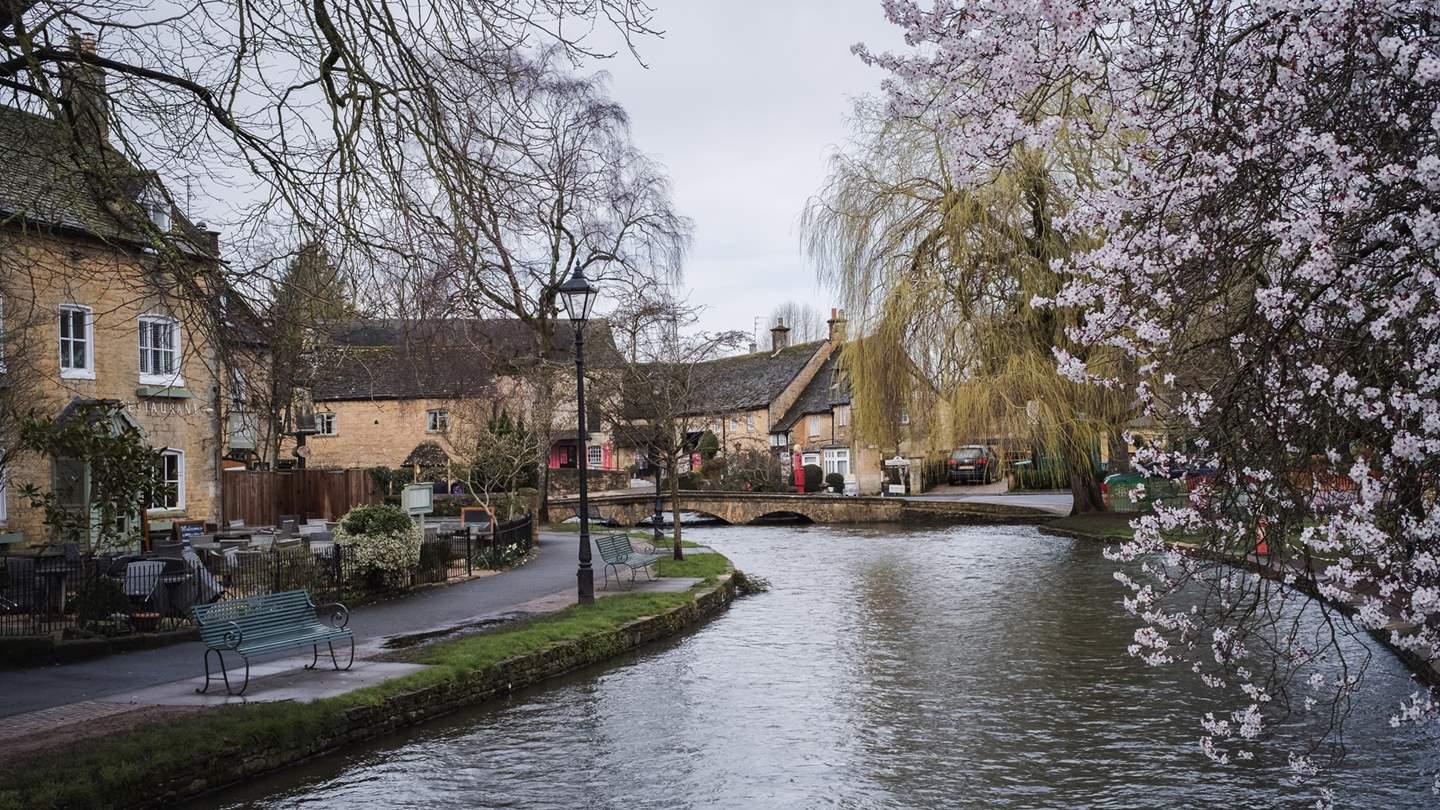 The pretty village of Bourton-on-the-Water promises charming Cotswolds scenes along the River Windrush 