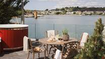 Take a seat on the deck and admire the views from the outdoor table and chairs 