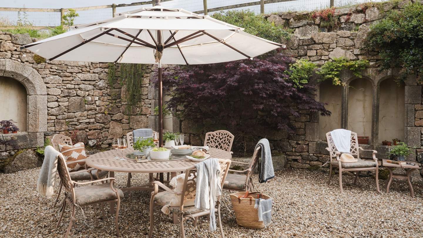 This heavenly retreat presents several seating and dining areas with breathtaking views