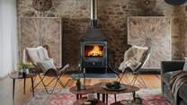 Light the wood burning stove in the cooler months for added ambience