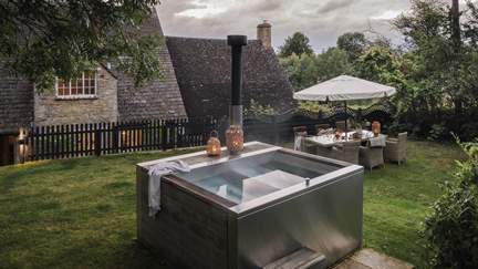 Luxury living moments await in the heavenly wood fired hot tub by Tubmarine