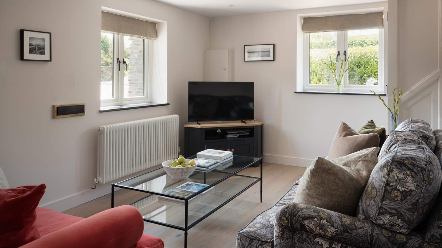 Both the lounge and the snug have Smart TVs for evening entertainment