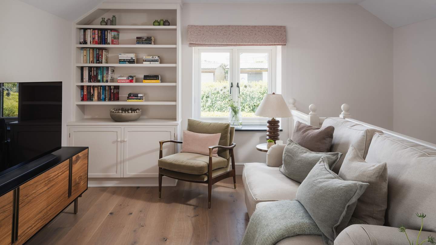 For those moments of stillness lost in film or fable, a light-filled living area, designed for adults to enjoy, can be found on the first floor