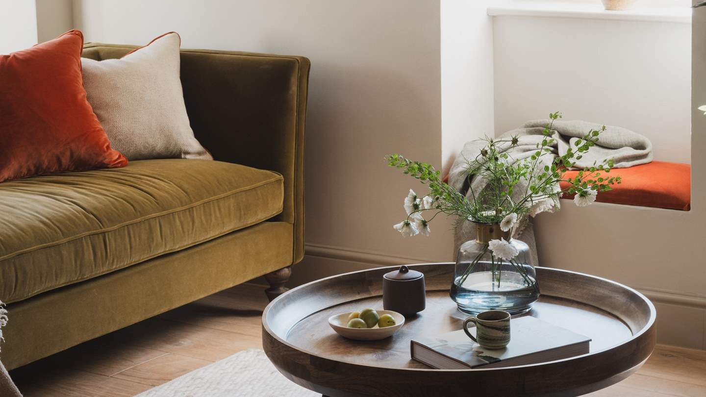 Velour sofas in earthy hues invite moments of calm at Delmare