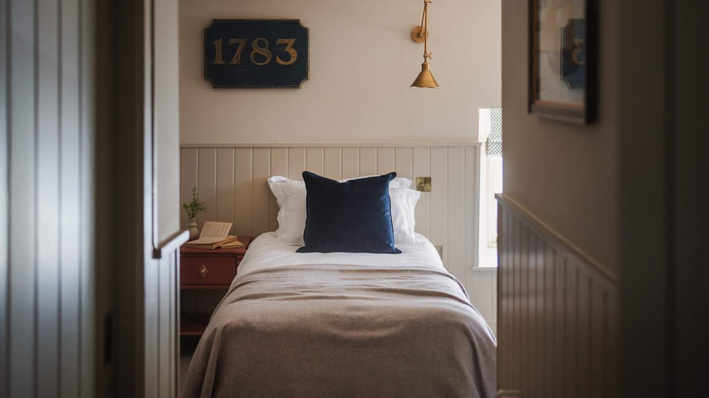 With characterful, sloping ceilings, the third bedroom is just perfect for children or friends