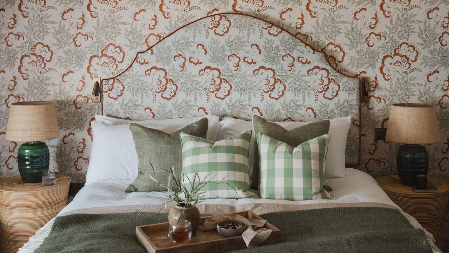 Positioned on the first floor, you'll find the darling second bedroom 