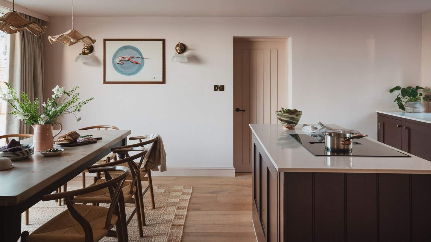 Crafted cabinetry features an array of integrated accoutrements for all your self-catering needs 