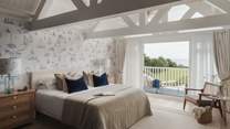 The second bedroom is a stunning sanctuary with nautical nuances
