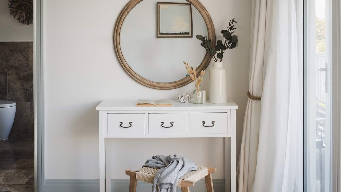 With a walk-in wardrobe and dressing table to stow treasures