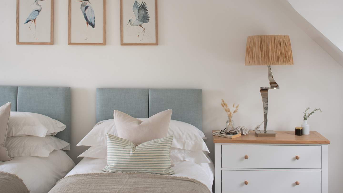 A walk-in wardrobe promises generous space, and an armchair and separate writing desk and chair offer somewhere to enjoy restful repose and reflection