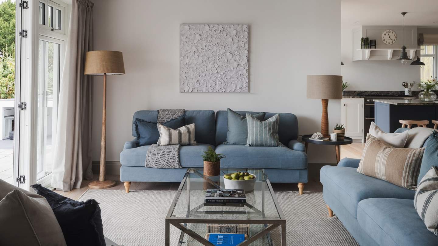 Inside, a curated array of open-plan living spaces and cosy corners propose space to gather and unwind