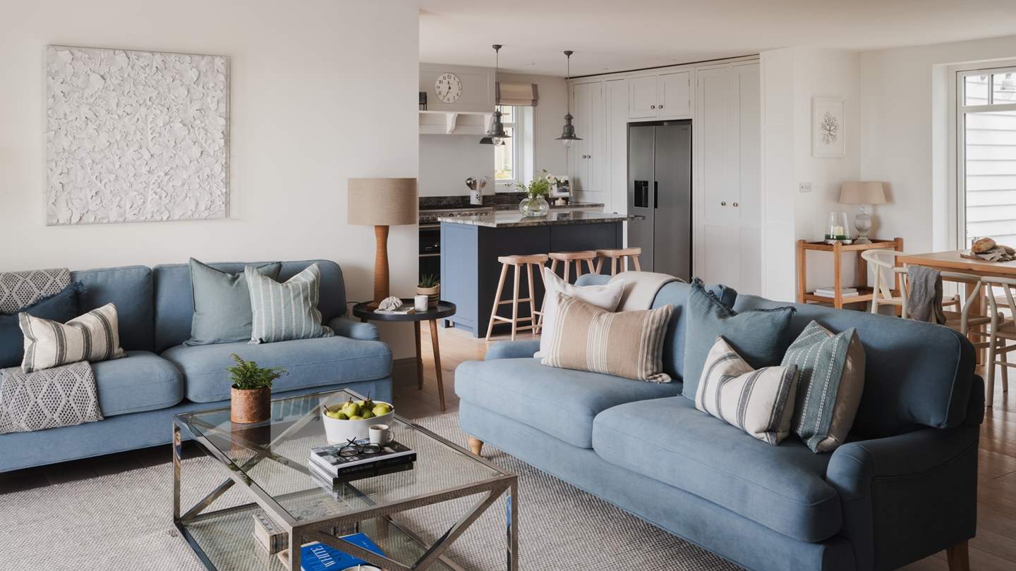 Adorned in soothing tones and coastal features, endless moments of calm reside in this serene living space