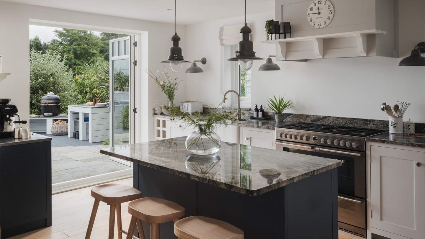 Imbuing coastal calm are tranquil tones, complemented by pops of colour from potted greenery