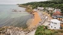 Less than half a mile away is the golden shawl of Steephill Cove Beach overlooked by charming cafés
