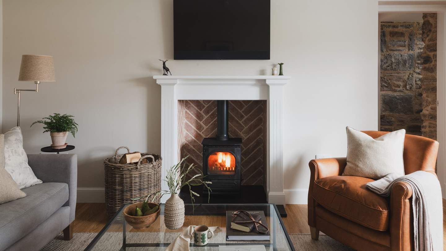 Seek cosy staycation scenes beside the wood burning stove