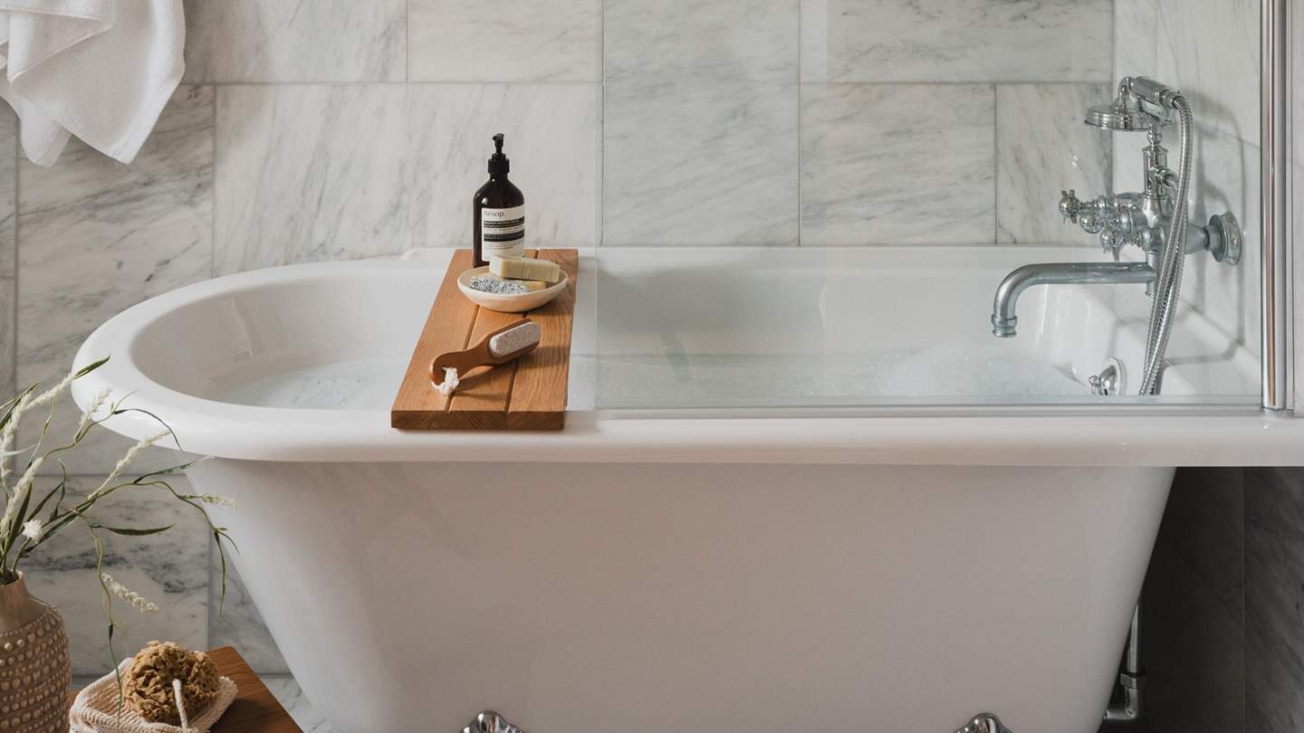 Savour refreshing showers and bubble-topped soaks in this delightfully luxurious space...