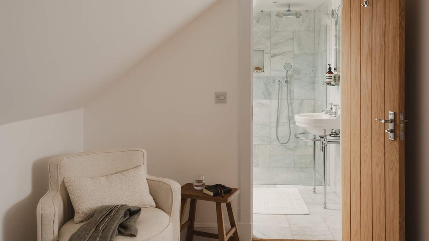 An occasional armchair is a cosy corner in which to recline