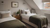 Two single beds welcome children and friends alike