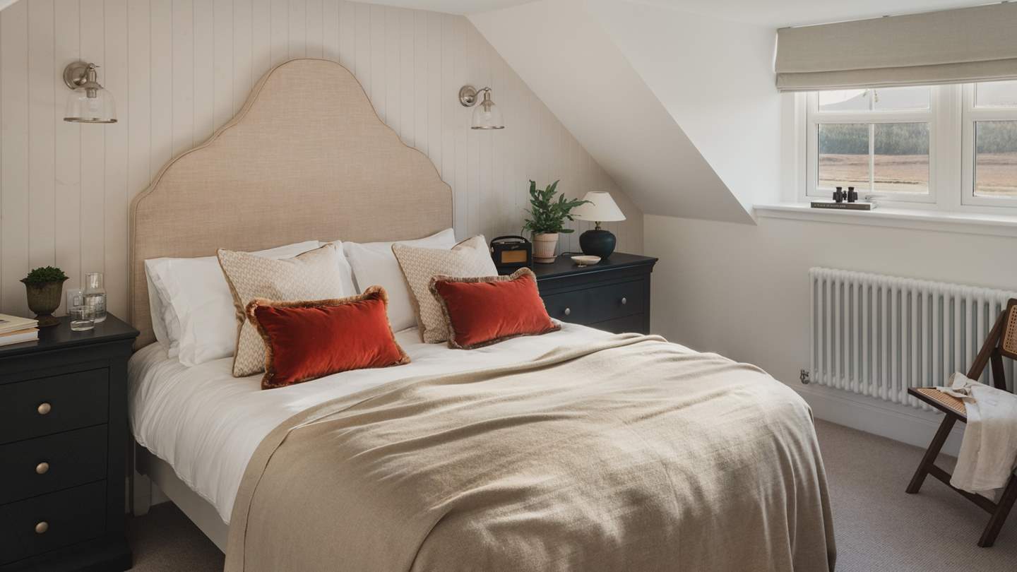 With a beautiful linen headboard above a king size bed, the third bedroom is a heavenly sanctuary in which to retreat at the end of the day