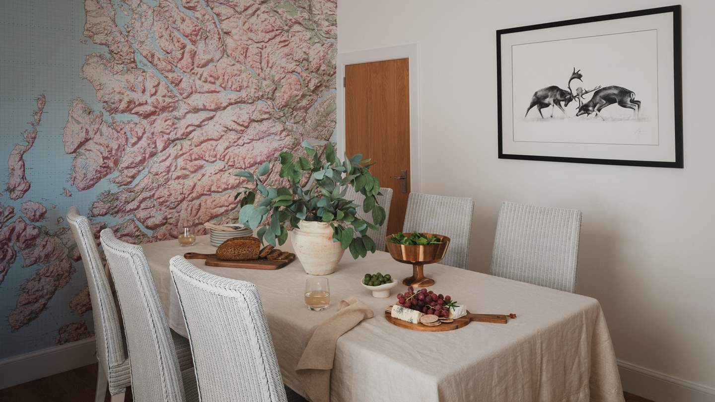 Unwind and dine beside the unique feature wall...
