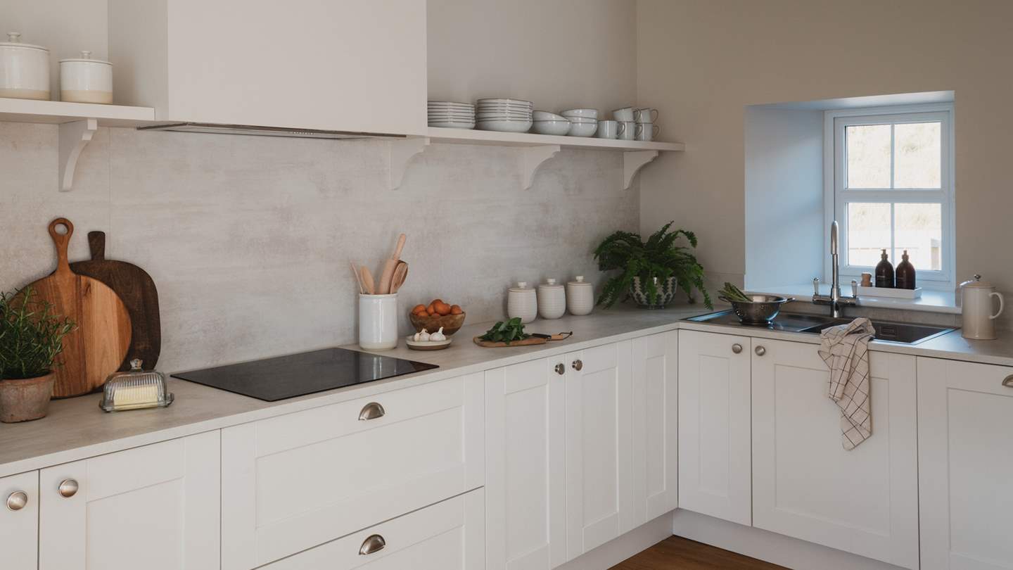 The kitchen promises a calming, pared-back design