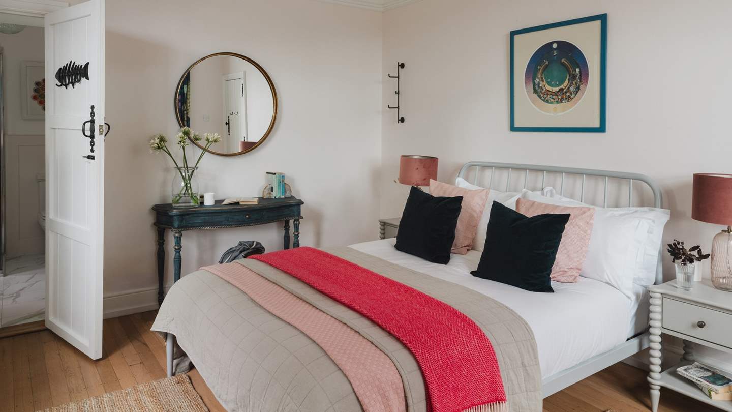 The third bedroom is home to a double bed enswathed in the finest linens and a super king duvet