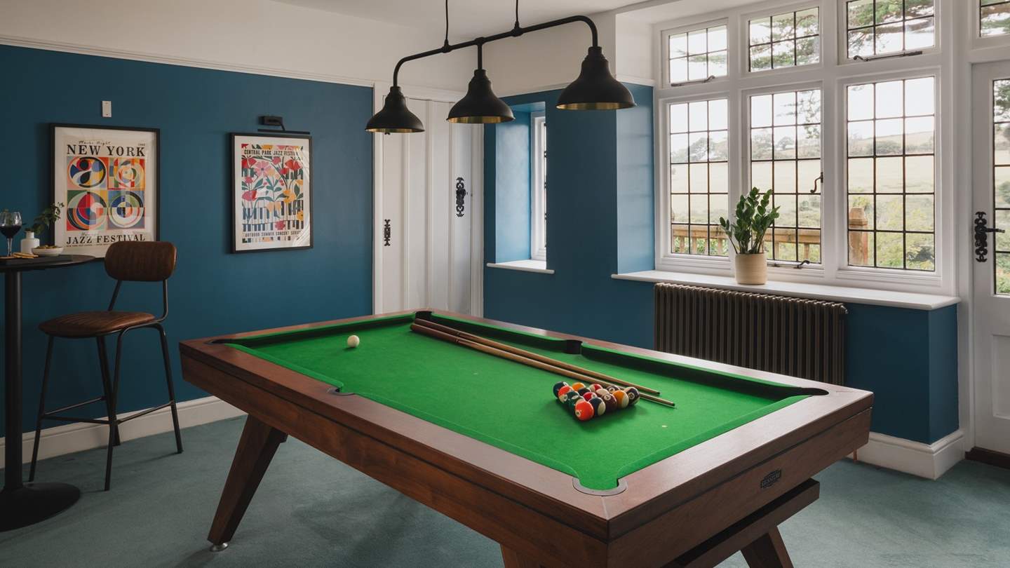 High-top table stools offer a place to relax, while a Vintage record player and vinyl collection play favourite tunes