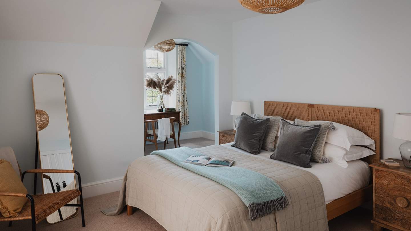 The master suite is a heavenly sanctuary where soothing hues and beautiful views evoke endless calm