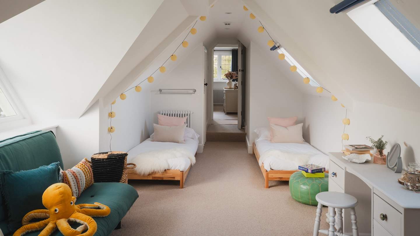 The second bedroom resides below characterful eaves 