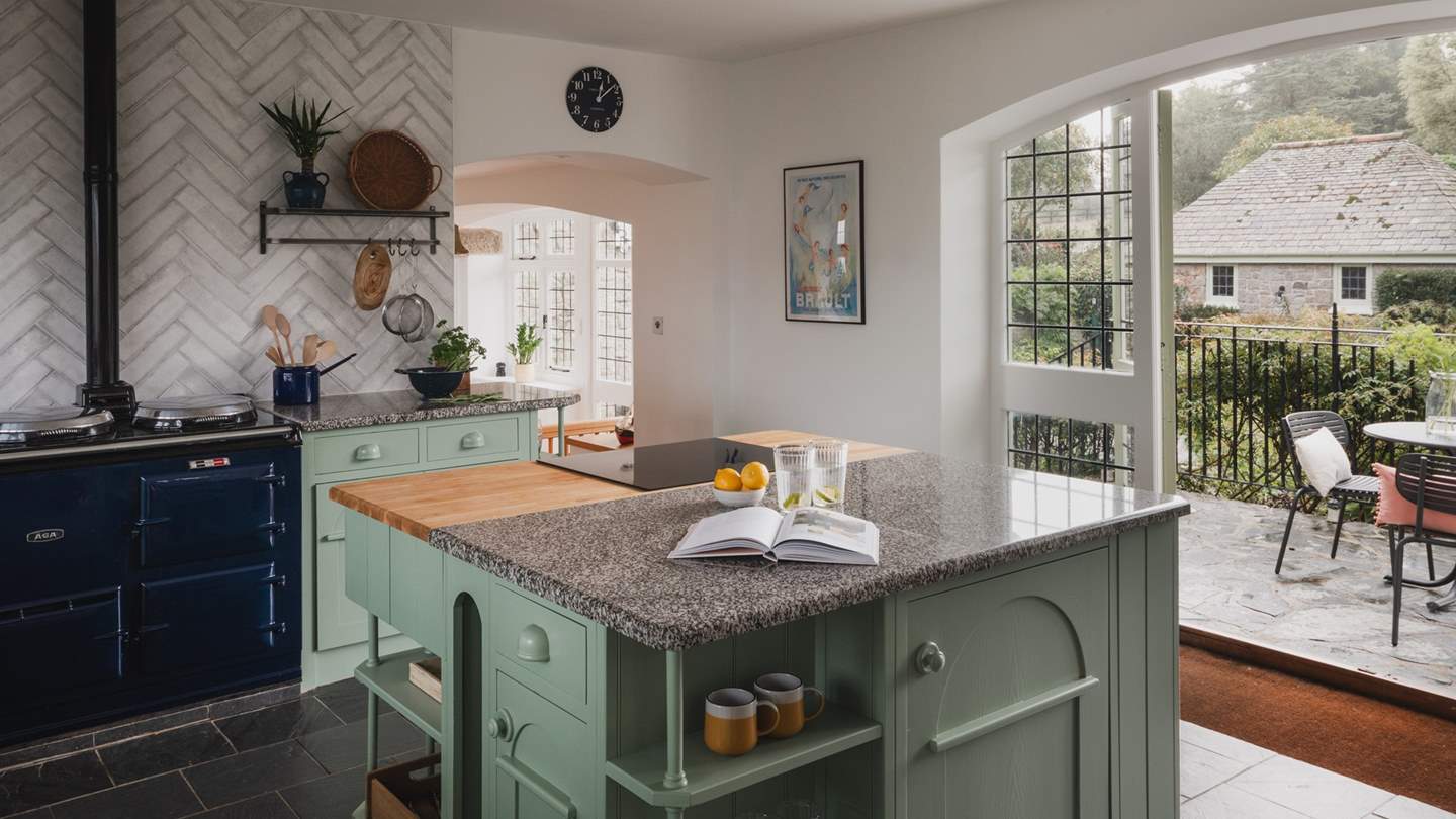 In the centre, a kitchen island takes the stage for cookbook moments