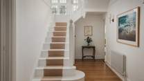 A set of stairs lead you to five of Serenata's six bedrooms