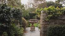 Beautiful garden spaces envelop our divine dwelling