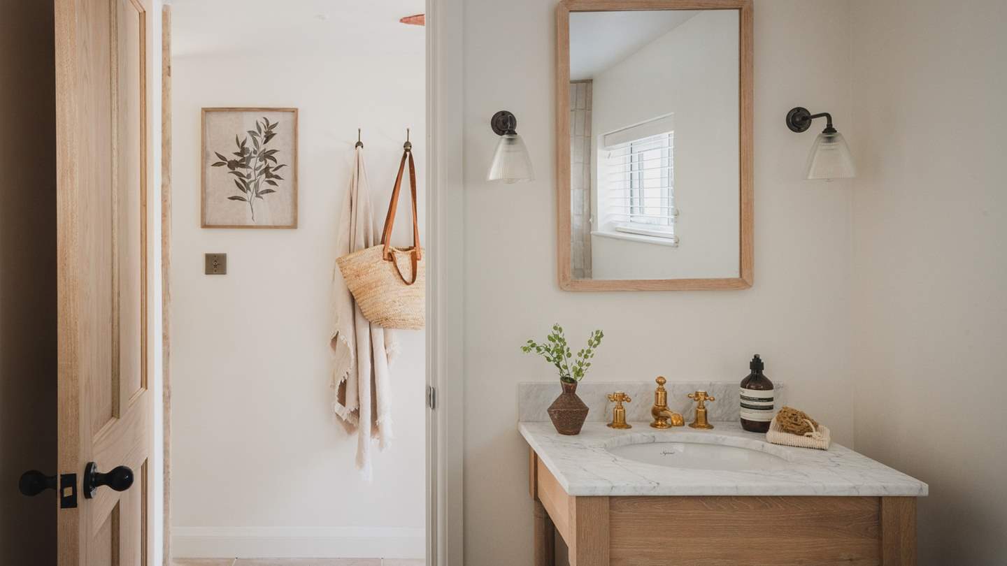 For pure comfort, uncover a beautiful bathroom which features a marble and oak vanity unit from Neptune 