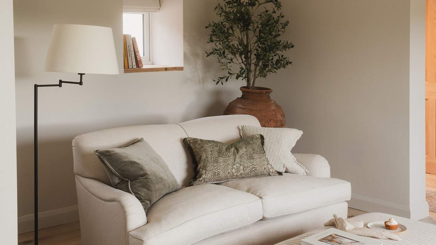 Settle into an agenda of blissful relaxation from the natural Cotswolds Company sofa 