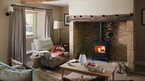 With heavenly interiors and a wood burning stove, a divine dwelling awaits