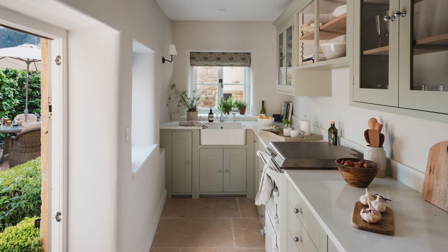 Bathed in calming hues, the stunning kitchen is a dream