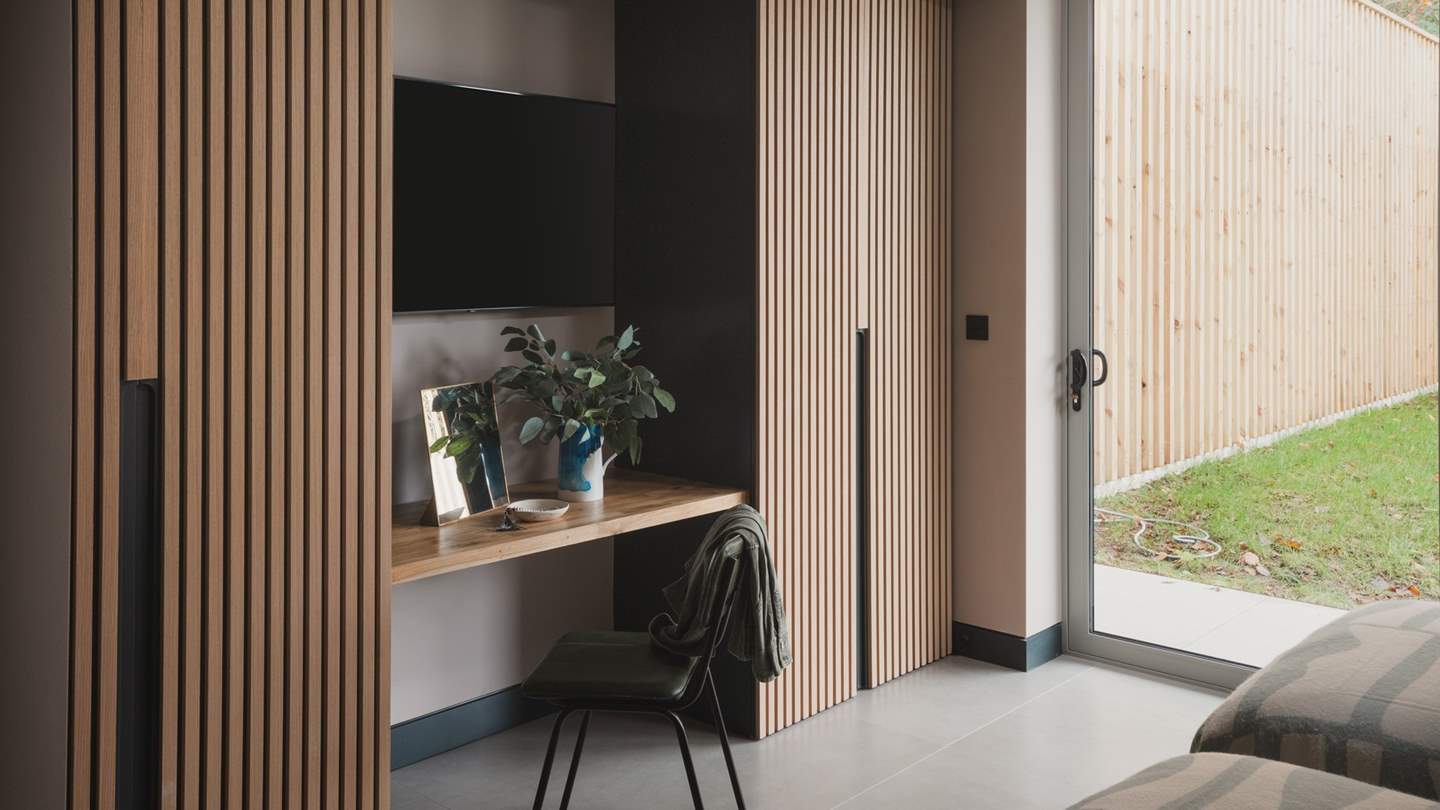 You'll find a wooden desk and chair for moments of mindfulness