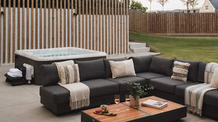 Retreat to the comfy corner sofa to enjoy your favourite movie outdoors