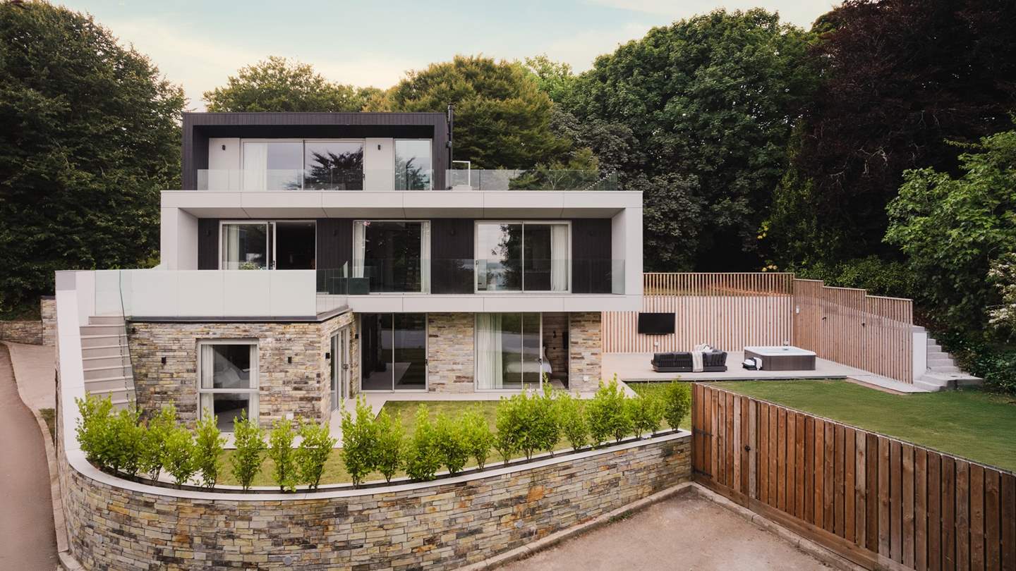 Extending living spaces and tempting for alfresco banquets under open skies are two separate dining areas accessed from the first floor