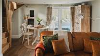 Uncover a spacious yet cosy open plan living and dining space