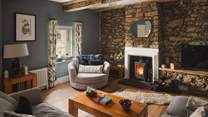 Cosy cottage interiors entwine period charm and modern comforts for luxurious living