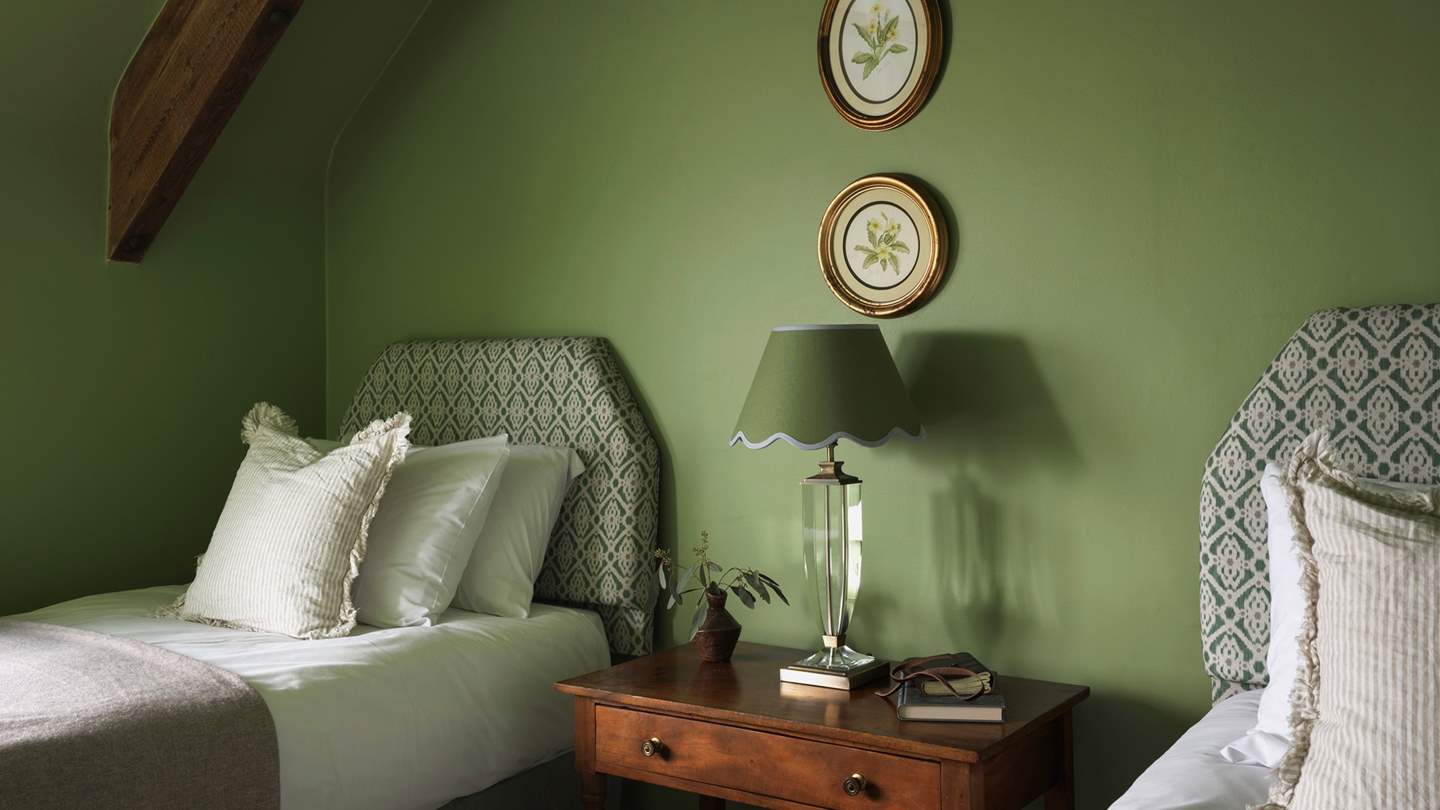 Perfect for friends or children, the third bedroom features two single beds that can also be transformed into a king upon request